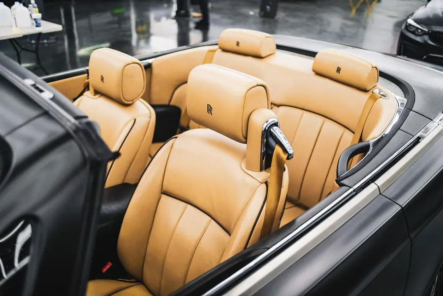Luxury tan leather interior of a chauffeured car serving Scarsdale NY