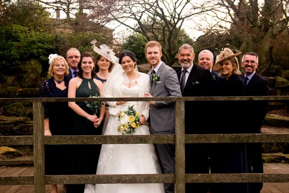 Bridal party gathered before boarding the limousine