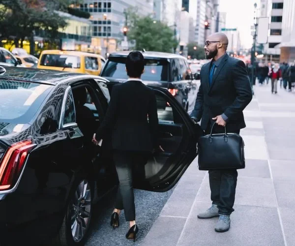 successful-business-partners-getting-in-car-at-cit-2024-05-28-17-44-19-utc-1-rdxs5wsuvjd5spzf7y1kxnqoec06z1fxqoxlkrxpc8